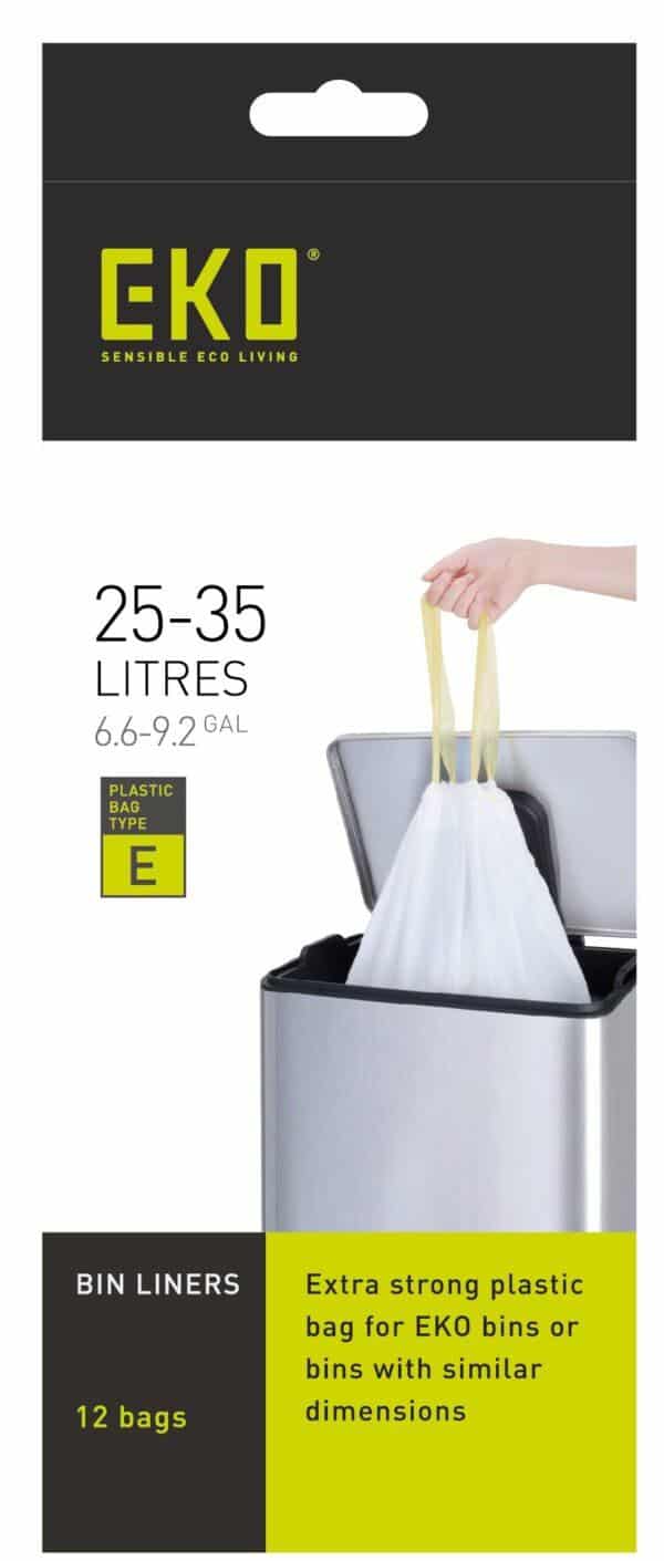 A hand disposing of a Size E Bin Liners 25-35L, 12 bags in a trash can.